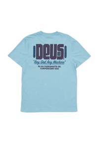 Light blue cotton t-shirt featuring a large dark purple graphic on the back with "DEUS" and the phrase "Any God Any Machine."