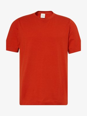 Red cotton T-shirt with short sleeves, crew neck, and Calvin Klein logo in a subtle print on the left side. Smooth texture, casual design.