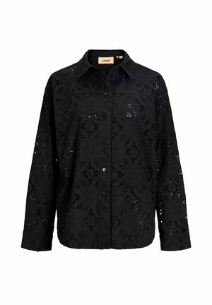 Musta pitkähihainen nappikiinnitteinen paita, jossa on kirjailtuja silmänreikäpitsiä geometrisillä ja kukallisilla kuvioilla, jossa on terävä kaulus ja etuosan napit.