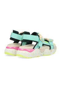 Infradito sportive con una toma mint green, cinghie regolabili e una suola bianca spessa con dettagli rosa e giallo fluo.