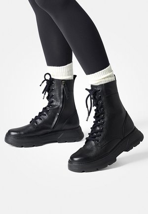 Botines con plataforma - schwarz
