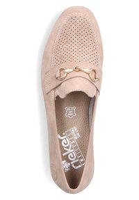 Beige suede slip-on shoe with perforated upper, decorative gold chain accent, and cushioned insole for comfort. Flat sole design.