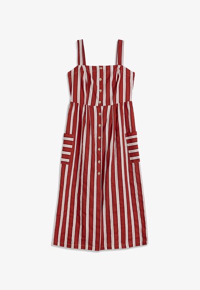 Robe midi sans manches à rayures verticales rouges, blanches et noires, avec des boutons sur le devant et de grandes poches de chaque côté.