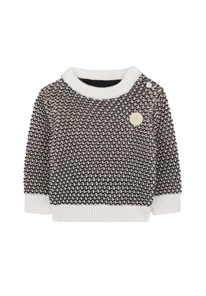 Pull en tricot avec un motif texturé en noir et crème, présentant un col et des poignets côtelés blancs, ainsi qu'un logo rond.