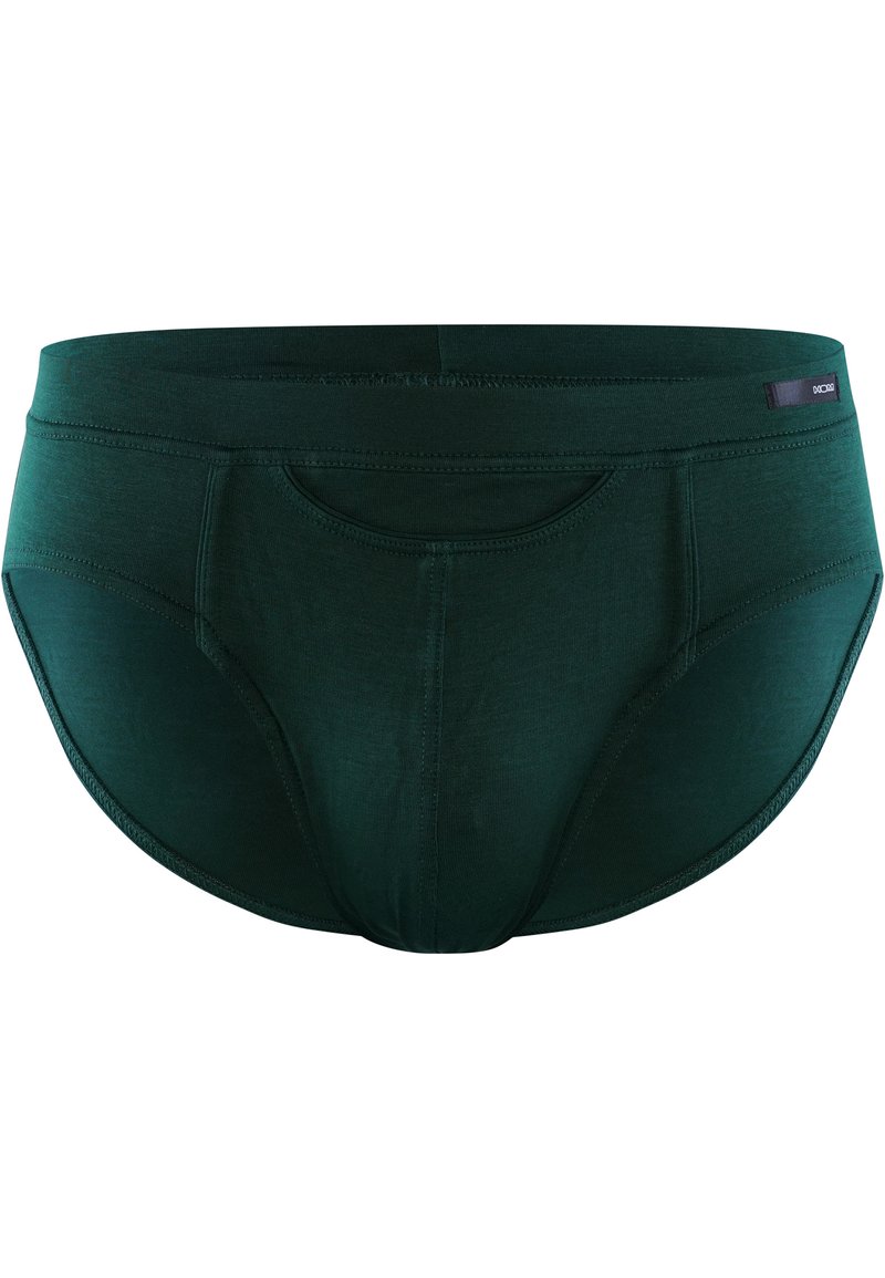 Biancheria intima in cotone verde scuro con una texture liscia, forma sagomata e una tasca frontale funzionale. L'elastico in vita presenta un'etichetta di branding discreta.