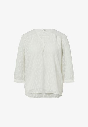 Blusa bianca in tessuto leggero con un motivo testurizzato. Caratterizzata da un collo a V, maniche a tre quarti e un delicato dettaglio a bottoni.