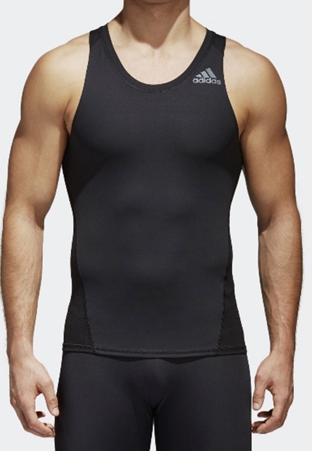 Débardeur de sport noir en tissu extensible avec col rond, logo Adidas sur l'épaule gauche et côtés sans coutures pour plus de confort.