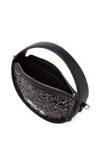 Black handbag with a circular design. Features a smooth leather exterior and a textured black interior with a zip closure and silver hardware.