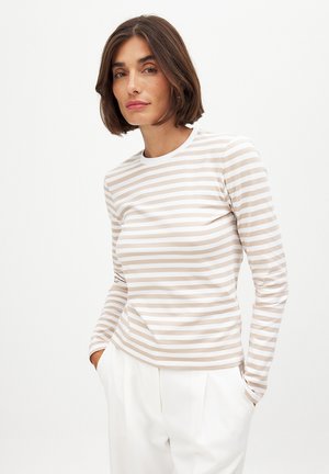 Long-sleeve top in beige and white horizontal stripes, made of soft fabric with a crew neck and a fitted silhouette.