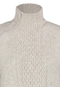 Cremefarbener Pullover mit einem hochgerippten Kragen und strukturiertem Zopfmuster, ausgestattet mit einem seitlichen Reißverschluss zum Schließen.