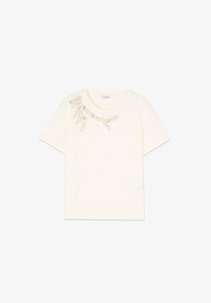 Crèmekleurig T-shirt met korte mouwen, ronde hals en delicate gouden bloemembroidery op de linkerschouder.