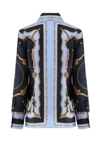 Long-sleeve shirt with blue and black panels, gold chain and belt patterns, and tiger illustrations near the bottom back corners.