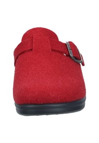 Red felt clog featuring a textured upper, adjustable buckle strap, and a rounded toe. The sole is black and slightly raised.