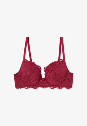 Reggiseno imbottito in pizzo rosso con ferretto, spalline regolabili e un piccolo fiocco di raso al centro davanti.
