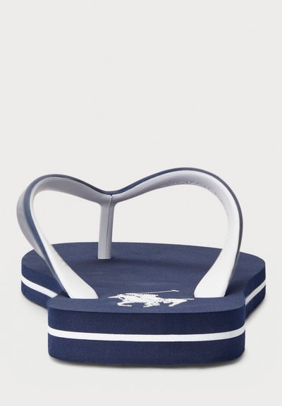 Navy flip-flop with white accents, thick textured sole, and rubber straps forming a heart shape. Features a logo on the footbed.