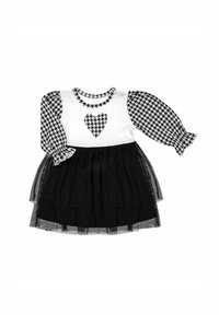 Czarna i biała sukienka z bufkami we wzór pepitki oraz białym gorsetem ozdobionym sercem, warstwowa spódnica z czarnego tiulu.