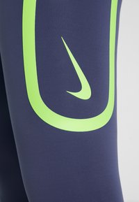 Nike Performance Leggings - purple