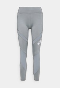 Grå träningsleggings med hög midja, med en kontrasterande blå paneldesign och vit märkning på sidan. Slät textur.