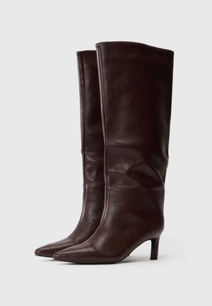 Rang 1: Simmi London - CAISYN - Čizme