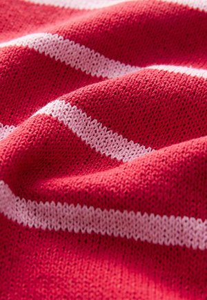 Knitted fabric with a wavy texture, featuring bold red and thin white stripes. The material appears soft and flexible.