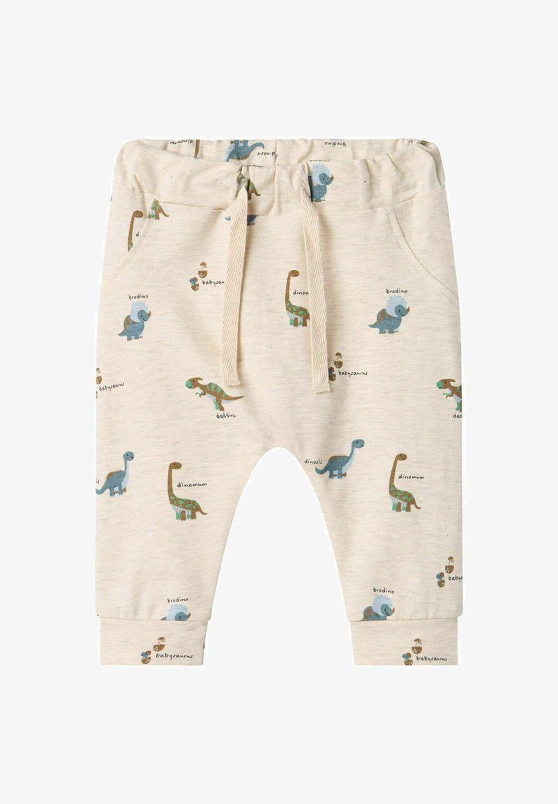 Pantalones de chándal para niños de color beige claro con patrones de dinosaurios en azul y verde. Cuentan con una cintura elástica y cordones para ajustarse.
