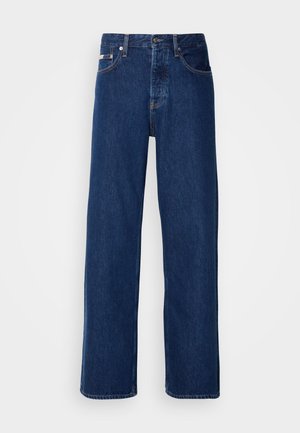 Dark blue denim jeans with a wide leg design, featuring a button closure and classic five-pocket styling. The fabric has a smooth texture.