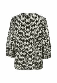 Schwarz-weiße Bluse mit Blattmuster, Rundhalsausschnitt und dreiviertellangen Puffärmeln mit elastischen Bündchen. Strukturierter Stoff.