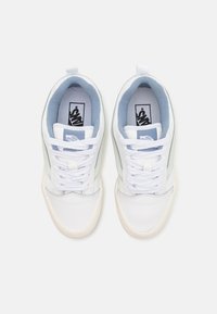 White sneakers with light blue accents, featuring a smooth leather upper, classic lace closure, and rubber sole. Vans logo on the insole.
