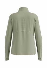 Helles grünes Langarmjacke mit hohem Kragen, Belüftungslöchern im Rücken und einer geschwungenen Naht entlang des oberen Rückens.