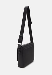 Tommy Hilfiger Skuldertasker - black