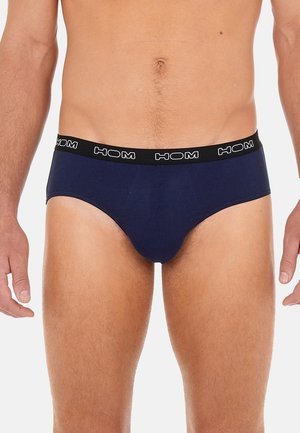 Herrenbriev in Marineblau mit einem schwarzen Gummibund, der den Markennamen "HOM" in Weiß trägt. Glattes Material und klassisches Design.