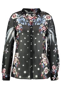 Sort gennemsigtig bluse med blomster mønstre og hvide prikker. Har krave, lange ærmer og knaplukninger. Tekstureret stof.
