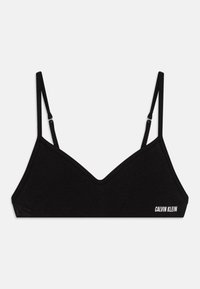 Čierny bavlnený bralet s hlbokým výstrihom do V. Obsahuje nastaviteľné ramienka a biele logo "CALVIN KLEIN" na boku.