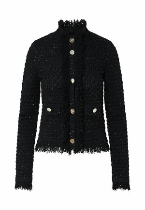 Veste noire texturée à manches longues avec bordure à franges, boutons argentés sur le devant et deux poches avant avec boutons argentés.