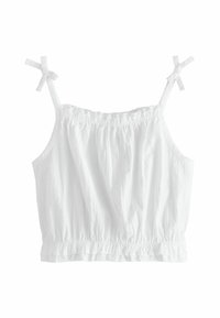 White cropped top featuring adjustable spaghetti straps with bow accents, gathered elastic waistband, and a smooth, lightweight fabric texture.