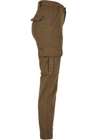 Brown cargo pants with front, side flap pockets, and elastic cuffs, shown from the side against a white background.