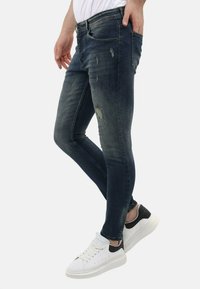 Local Fanatic RIPPED SLIM FIT STRETCH - Slim fit jeans - blauw