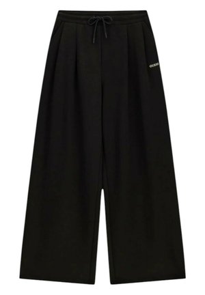 Pantaloni neri a gamba larga con vita elasticizzata e coulisse, con pieghe frontali e piccolo logo "Guess" sul lato destro.