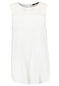 Haut blanc sans manches avec détail en dentelle au niveau de l'encolure, en tissu lisse, présentant une forme ronde et une fermeture au dos avec trou clé.