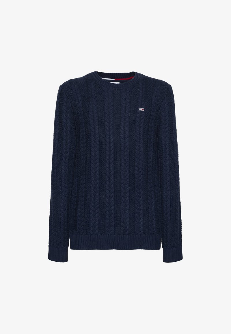 Navy blue knitted sweater with a textured cable pattern, crew neckline, and ribbed cuffs. Features a small logo patch on the left chest.
