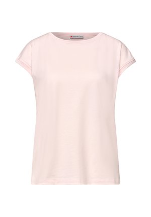 Lyserød kortærmet dame-T-shirt med rund hals og lille mærke indeni kraven.