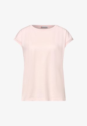 Vaaleanpunainen naisten lyhythihainen T-paita, jossa pyöreä kaulus ja pieni merkkilappu kauluksessa sisäpuolella.