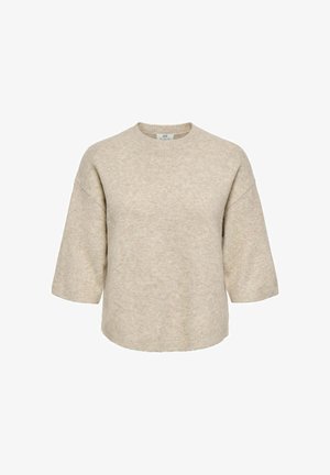 Beež lühikeste varrukatega kudum, millel on ümmargune kaelus ja lõdvestunud istuvus, valmistatud pehmest tekstuuriga kangast.