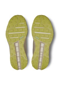 Talpa de pantof cu o suprafață din cauciuc texturat galben-verde, având modele rectangulare și pătrate, și o bandă centrală de culoare deschisă pentru suport.