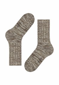 Braune gerippte Socken mit einem strukturierten Muster, das ein kontrastierendes gepunktetes Design aufweist. Knöchellang mit einer abgerundeten Zehenform und weichem Stoff.