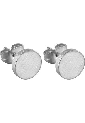 Boucles d'oreilles en métal argenté brossé avec un design rond. Chaque boucle d'oreille dispose d'une surface texturée et d'un fermoir à tige sécurisé.