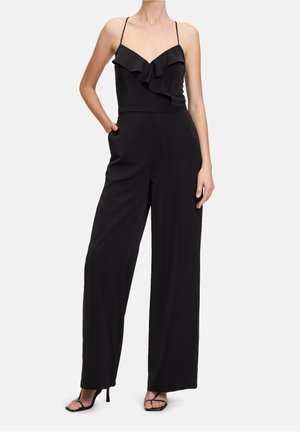 Black jumpsuit with spaghetti straps, ruffled neckline, and wide legs. Features side pockets and a smooth fabric texture.