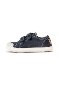 Zapatilla infantil de color azul oscuro con suela blanca, dos correas de Velcro ajustables y puntera blanca reforzada.