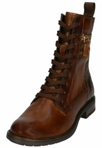 Bottine en cuir marron avec une texture lisse, dotée d'un laçage à l'avant, d'une fermeture éclair sur le côté et d'accents à motifs sur le talon.