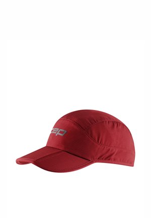 Red cap made of lightweight fabric, featuring a curved brim and stitched detailing. Accented with a silver logo on the front.